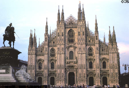 Duomo (1386 - 1809) commissioned by Gian Galeazzo Visconti facade in late afternoon sun. Milan, Italy. Style: Lombard Gothic. Architect: Nicholas de Bonaventure then Fillipino degli Organi.