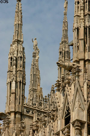 Gothic spires & gargoyles on Duomo. Milan, Italy.