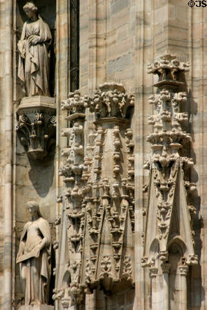 Two female saints on Duomo. Milan, Italy.