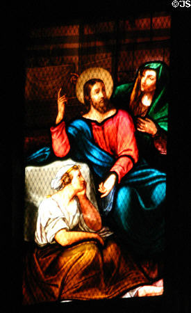 Story of Christ in stained-glass scene in Duomo. Milan, Italy.