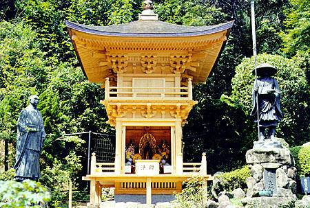 Statues and wooden shrine at the Daishoin Temple, Miya-jima. Japan.
