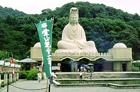 Big Buddha statue on a building in Kyoto. Japan.