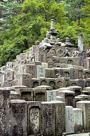 Stacked stone markers of a cemetery in Takayama. Japan.