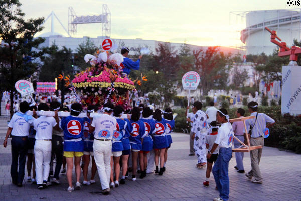 Procession carries Japanese float at Expo 85. Tsukuba, Japan.