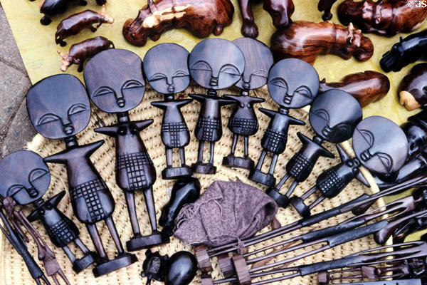 Woodcarvings of abstract humans & animals at a crafts market near Nairobi. Kenya.