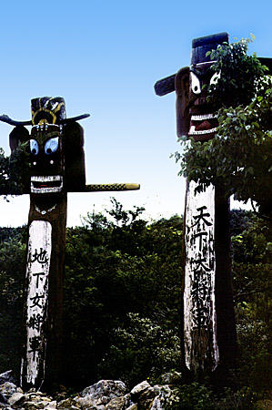 Wooden totem carvings in folk village which lies 41km south of Seoul. South Korea.