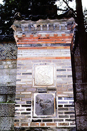Decorated brick chimney on Ch'angdokkung Palace, Seoul. South Korea.