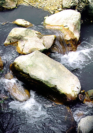 Stream beneath the waterfall at the Diamond Gardens near Soufrière. St Lucia.