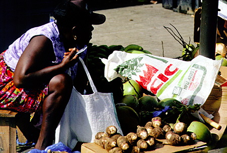 Local produce seller at Castries Market. St Lucia.