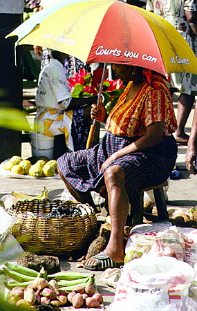 Produce seller at Castries Market. St Lucia.