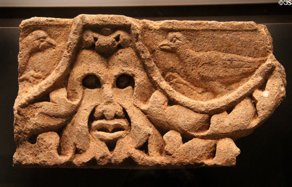 Face & birds carved stone architectural elements (1st-3rdC) from sanctuary in ancient village of Titelberg (now Luxembourg) at National Museum of History & Art. Luxembourg, Luxembourg.