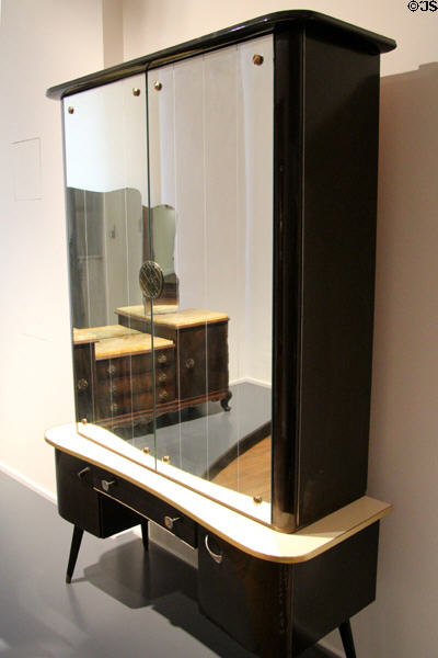 Mirrored wardrobe (1951-62) made of beech wood, glass, Formica & aluminum from Germany & likely purchased at Europa-Möbel at National Museum of History & Art. Luxembourg, Luxembourg.