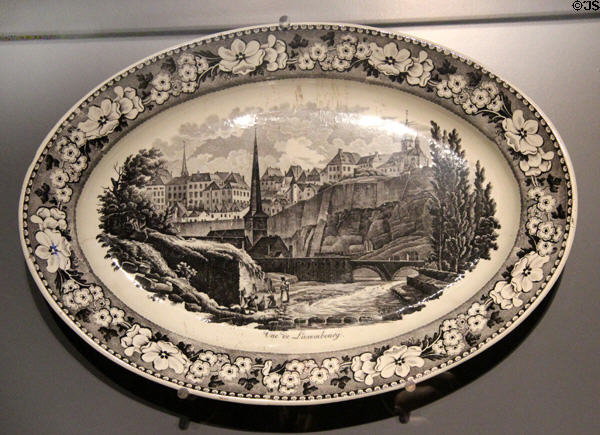 Oval plate with view of Luxembourg taken from painting by J-B Fresez made by Boch at Septfontaines-lez-Luxembourg at National Museum of History & Art. Luxembourg, Luxembourg.