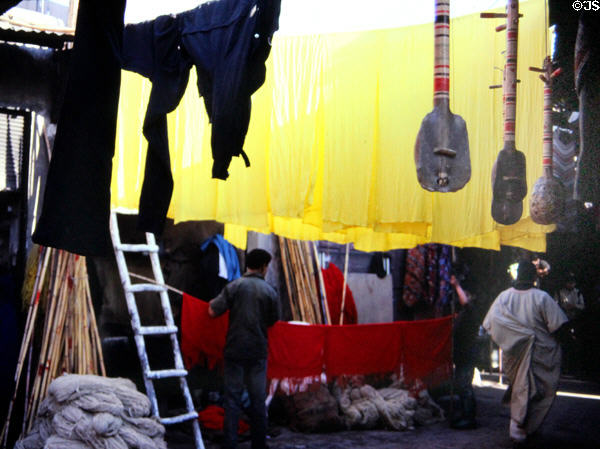 Cloth hanging in dyer's district market. Marrakesh, Morocco.