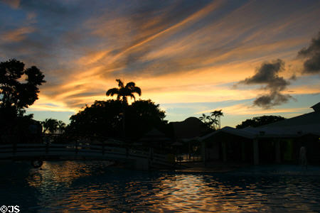 Sunset over resort hotel at Diamond Point. Diamant, Martinique.