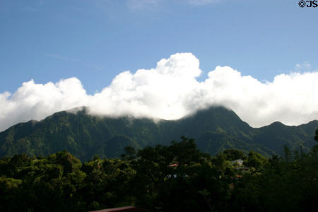 View of Pitons forest-covered mountain ridge from Morne-Verte. Martinique.