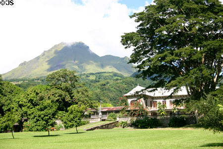 Pelée volcano & Chateau Depaz, built 20 years after eruptions of May 8, 1902 destroyed original house. Martinique.