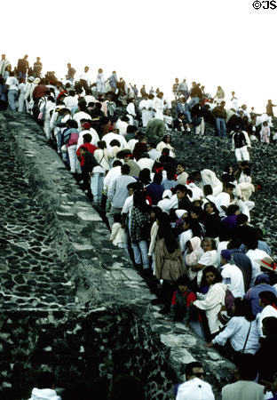 People celebrating March 21 spring equinox by climbing Pyramid of Sun at Teotihuacán. Mexico.