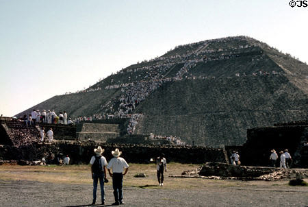 Pilgrims climb Pyramid of Sun at Teotihuacán. Mexico.