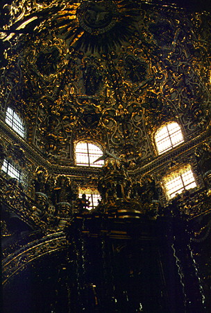 Gold leaf dome interior of Rosary Chapel in church of Santo Domingo, Puebla. Mexico.