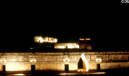 Pre-Colombian architecture of Mayan site of Uxmal floodlit at night. Mexico.