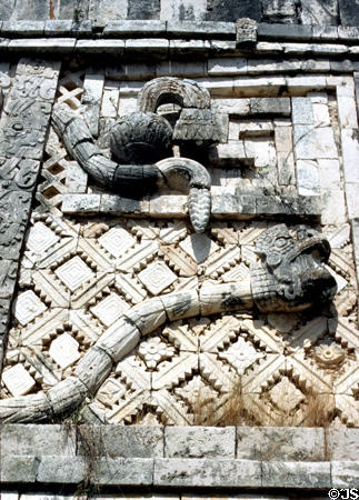 Rattlesnake sculpture in Uxmal winds its way around a building in Nunnery Quadrant & finds its tail again. Mexico.