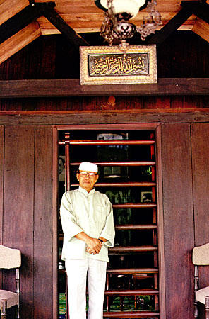 Entrance to traditional Malay house in Kuala Lumpur has bars to lock the door. Malaysia.