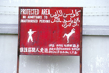 Graphic warning sign outside the fort in Georgetown. Malaysia.