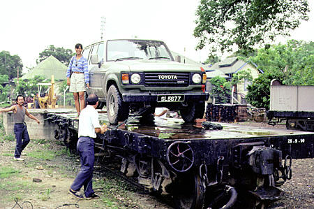 Car loaded on the train due to lack of roads from Tenom to Beaufort, on Borneo island. Malaysia.