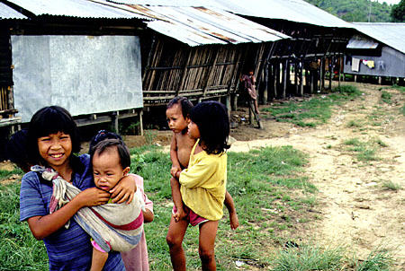 Children at Rungus longhouse near Kota Kinabalu on island of Borneo. Malaysia.