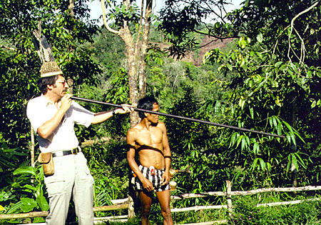 Jim Steinhart learns to use a blowgun at Ugat longhouse in Sarawak. Malaysia.