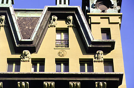 Detail of baboon sculptures on hotel along Damrak. Amsterdam, Netherlands.