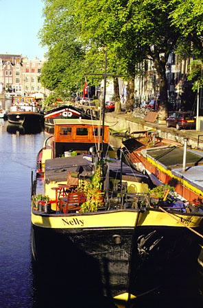 Houseboats on Oudeschans. Amsterdam, Netherlands.