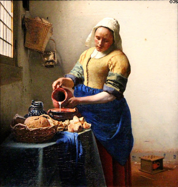 The Milkmaid painting (c1660) by Johannes Vermeer at Rijksmuseum. Amsterdam, NL.