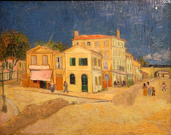 Painting of Yellow house in Arles (center with green door) rented as artist's studio & living quarters which Vincent shared with Paul Gauguin (1888) by Vincent van Gogh at Van Gogh Museum. Amsterdam, NL.