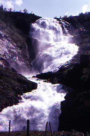 A waterfall on Bergen Railroad from Myrdal which stops for tourist photos. Norway.