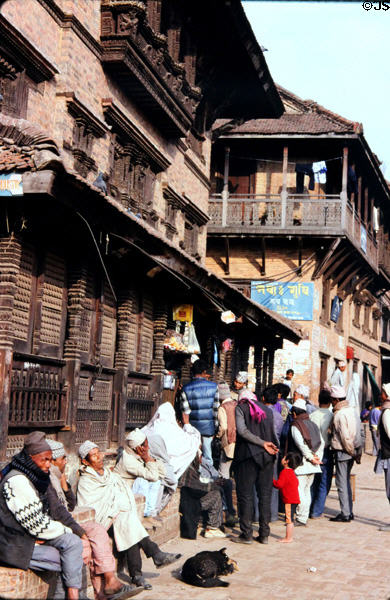 People crowd street off Dattatraya Square in Bhaktapur a UNESCO World Heritage site near Katmandu. Nepal.