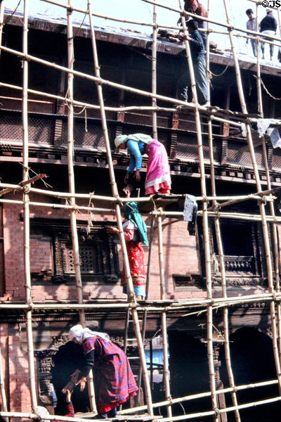 Women working on scaffolding in Patan (Lalitpur), Katmandu. Nepal.