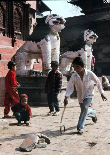 Children playing hoops in Katmandu. Nepal.