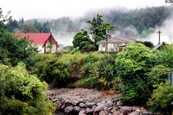 Village amid steam in Rotorua, one of the few places in New Zealand with warmth for native habitation. New Zealand.