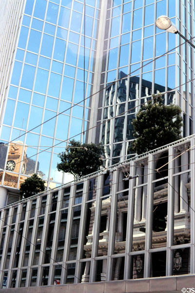 Reflections in the modern glass building across from Civic Square. Wellington, New Zealand.