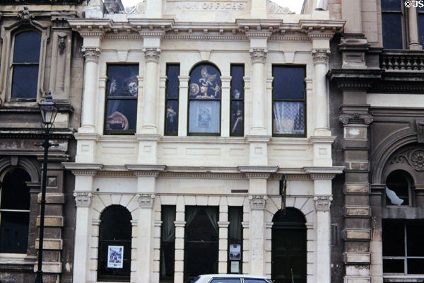 Building facade in Oamaru with fanciful decorations. New Zealand.