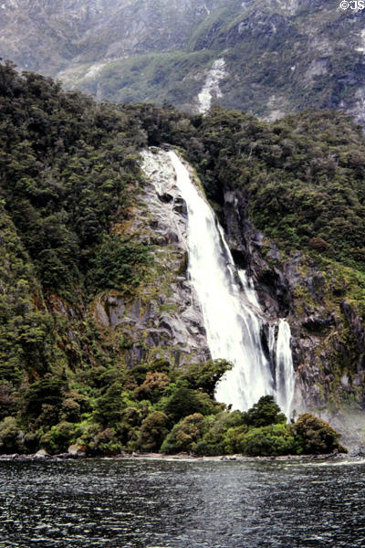 Waterfall at Milford Sound. New Zealand.