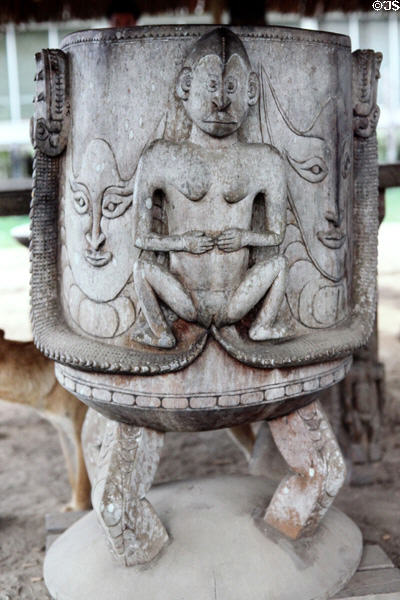 Angoram magistrate's chair carved with woman giving birth to two snakes represents the scales of justice. Papua New Guinea.