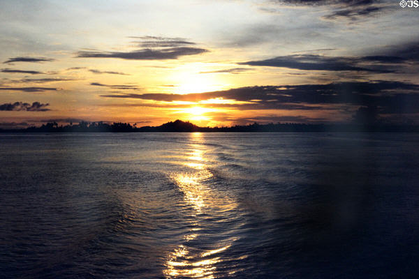 Sunset over the water of Sepik River. Papua New Guinea.