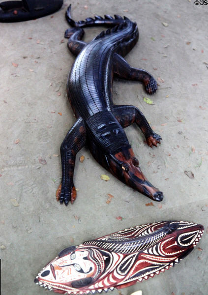 Crocodile and shield carvings created by artists in Tambanam. Papua New Guinea.