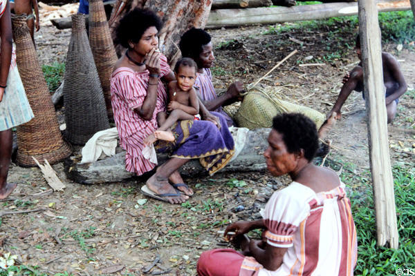 A family rests under a tree in Timbunke. Papua New Guinea.