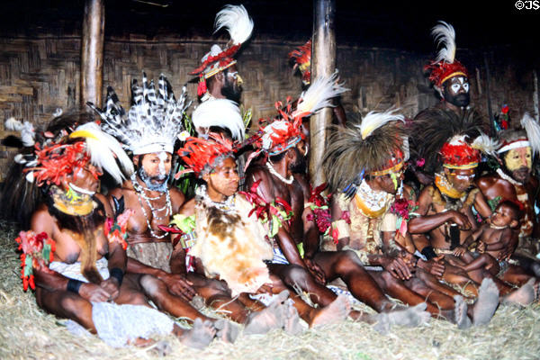 The couples sitting together during a courtship ritual near Banz. Papua New Guinea.