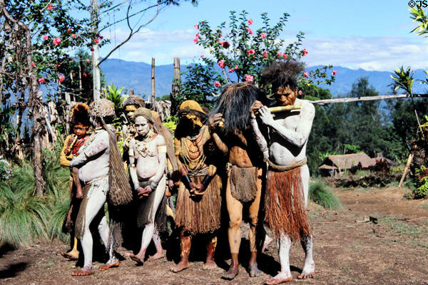 Villagers involved in a ritual in the Mudmen village. Papua New Guinea.
