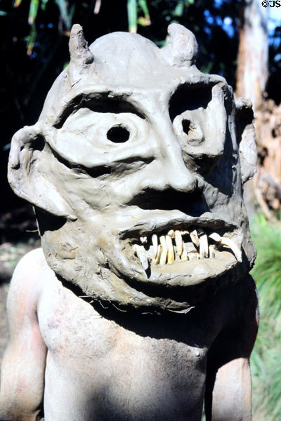 Sharp toothed clay mask of a Mudman in the Mudman village. Papua New Guinea.